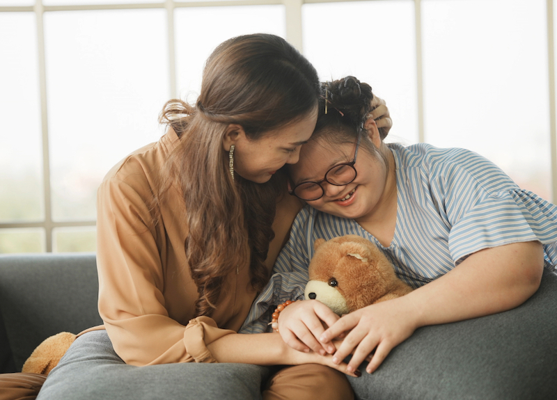 carer with disabled person